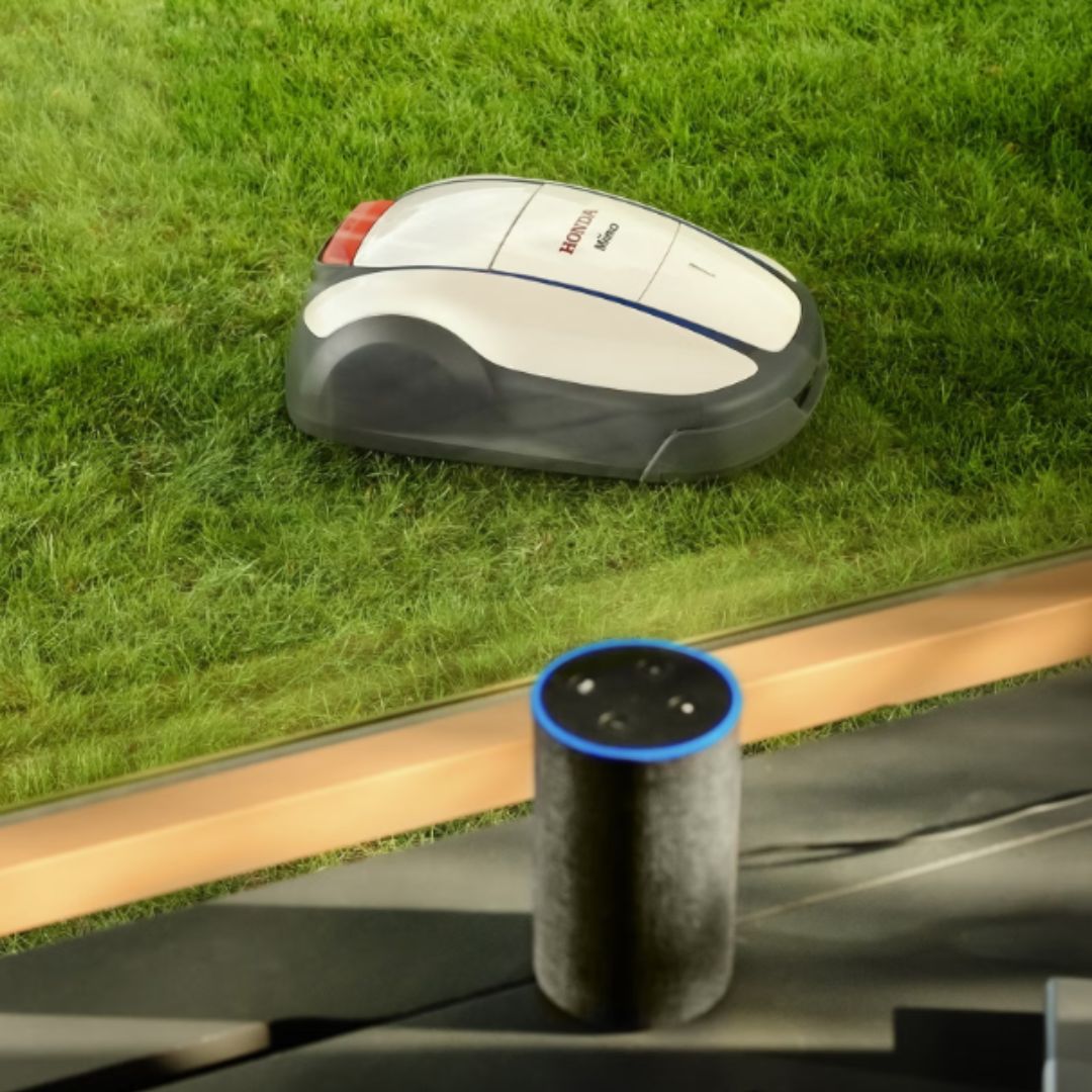 Honda Miimo HRM 1500 Live robotic lawn mower maintaining a lawn while connected to smart home control for convenient remote operation.